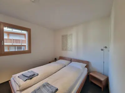 Ein Bett oder Betten in einem Zimmer der Unterkunft Pastis