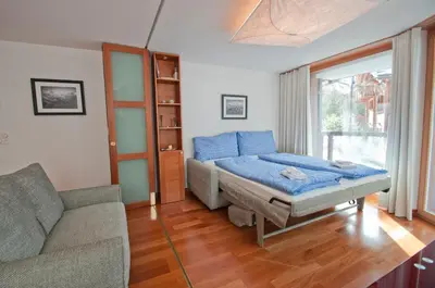 Ein Sitzbereich in der Unterkunft Casa D'Amore, Apartment Lyskamm
