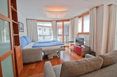 Ein Bett oder Betten in einem Zimmer der Unterkunft Casa D'Amore, Apartment Lyskamm
