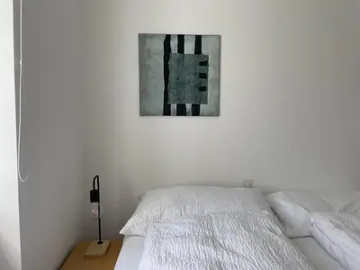 Ein Bett oder Betten in einem Zimmer der Unterkunft Terra - Haus auf dem Sand
