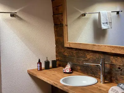 Ein Badezimmer in der Unterkunft Chalet Brünig