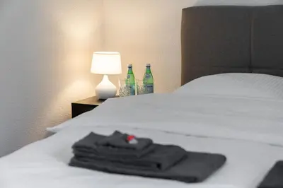 Ein Bett oder Betten in einem Zimmer der Unterkunft Moderne Neubauwohnung in Wilderswil