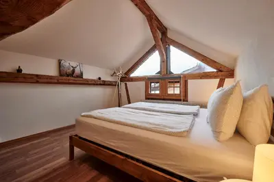 Ein Bett oder Betten in einem Zimmer der Unterkunft Lakeside Tiny House Brienz