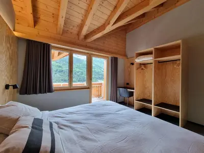 Ein Bett oder Betten in einem Zimmer der Unterkunft Sole Penthouse