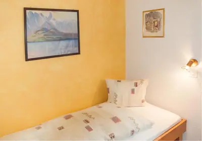Ein Bett oder Betten in einem Zimmer der Unterkunft Ferienwohnung Hirschen