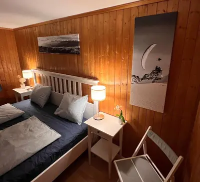 Ein Bett oder Betten in einem Zimmer der Unterkunft CLOUD No3, Interlaken