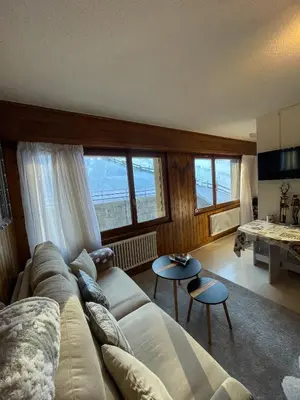 Ein Sitzbereich in der Unterkunft Jolie appart cozy, Ski in Ski out