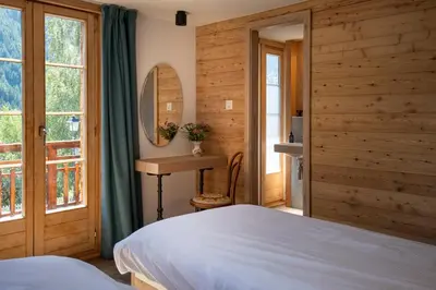 Ein Bett oder Betten in einem Zimmer der Unterkunft La Bergère
