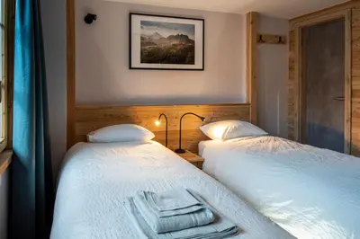 Ein Bett oder Betten in einem Zimmer der Unterkunft La Bergère