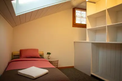 Ein Bett oder Betten in einem Zimmer der Unterkunft Uncle Eric's Chalet