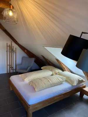 Ein Bett oder Betten in einem Zimmer der Unterkunft Studio JASMINE interlaken
