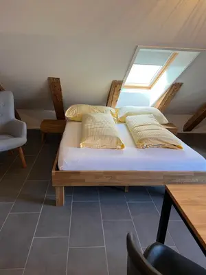 Ein Bett oder Betten in einem Zimmer der Unterkunft Studio JASMINE interlaken