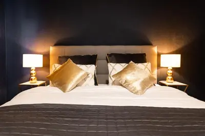 Ein Bett oder Betten in einem Zimmer der Unterkunft The Blue Ice Apartment - GRINDELHOMES