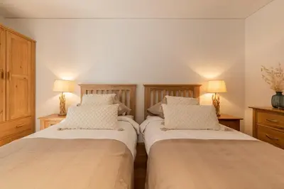 Ein Bett oder Betten in einem Zimmer der Unterkunft The Terrace Apartment - GRINDELHOMES
