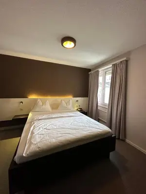 Ein Bett oder Betten in einem Zimmer der Unterkunft Residence am Marktplatz
