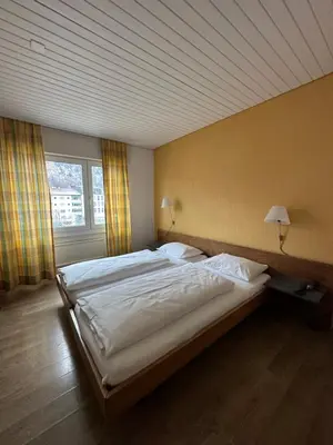 Ein Bett oder Betten in einem Zimmer der Unterkunft Residence am Marktplatz
