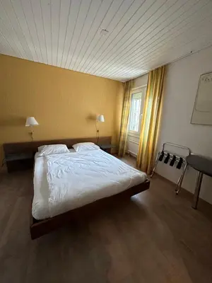 Ein Bett oder Betten in einem Zimmer der Unterkunft Residence am Marktplatz
