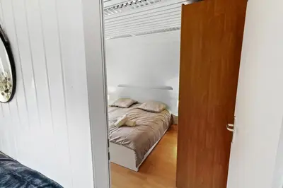 Ein Bett oder Betten in einem Zimmer der Unterkunft Appartement confortable avec un sauna