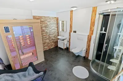 Ein Badezimmer in der Unterkunft Appartement confortable avec un sauna