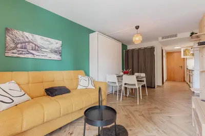 Ein Sitzbereich in der Unterkunft Cosy and modern apartment closed to the ski lift
