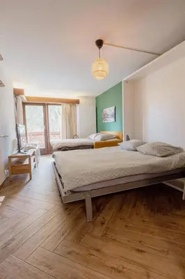 Ein Bett oder Betten in einem Zimmer der Unterkunft Cosy and modern apartment closed to the ski lift