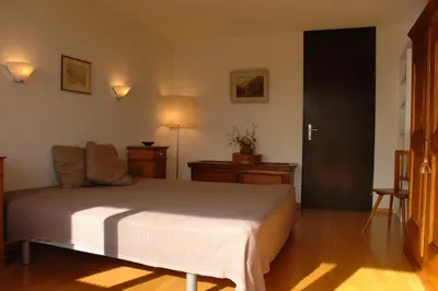 Ein Bett oder Betten in einem Zimmer der Unterkunft Apartment Eglantine with stunning views of the Valais Peaks