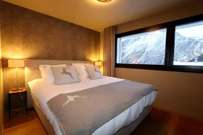 Ein Bett oder Betten in einem Zimmer der Unterkunft Hollywood 1 - A luxury, comfortable and spacious apartment located directly on the slopes!