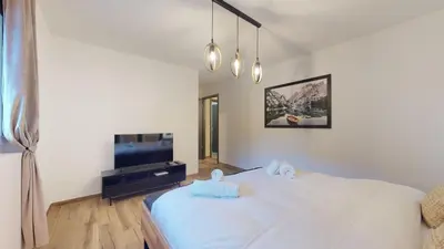 Ein Bett oder Betten in einem Zimmer der Unterkunft Spacious apartment - beautiful terrace with view