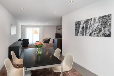 Ein Sitzbereich in der Unterkunft Modern City Apartments