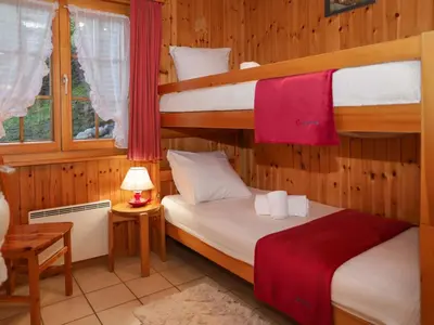Ein Bett oder Betten in einem Zimmer der Unterkunft Chalet Ushuaia by Interhome