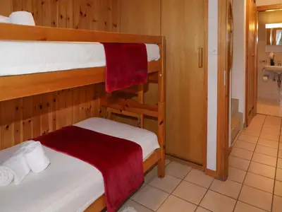 Ein Bett oder Betten in einem Zimmer der Unterkunft Chalet Ushuaia by Interhome