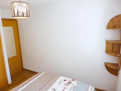 Ein Bett oder Betten in einem Zimmer der Unterkunft Apartment Le Torrent 1 by Interhome