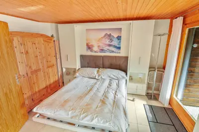 Ein Bett oder Betten in einem Zimmer der Unterkunft Superbe appartement avec parking couvert gratuit