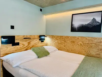 Ein Bett oder Betten in einem Zimmer der Unterkunft Peaky Riders Self Check-in Hotel