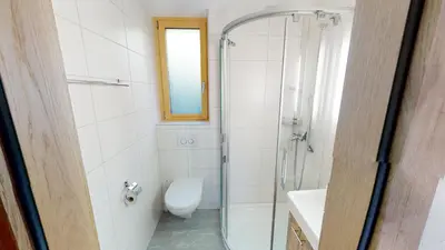 Ein Badezimmer in der Unterkunft Tschuggen 11