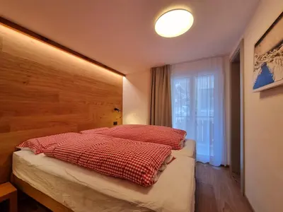 Ein Bett oder Betten in einem Zimmer der Unterkunft Rio ski-in, ski-out