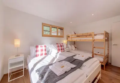 Ein Bett oder Betten in einem Zimmer der Unterkunft Chalet Stella Alpina