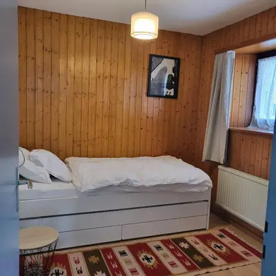Ein Bett oder Betten in einem Zimmer der Unterkunft Appartement Randogne avec grande terrasse