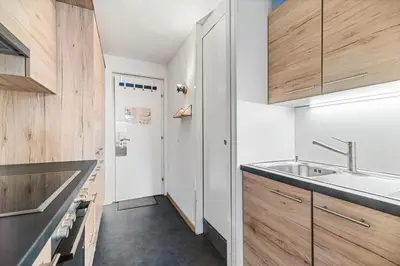 Küche/Küchenzeile in der Unterkunft Chaleureux studio à Anzère, accessible à ski, proche de tout