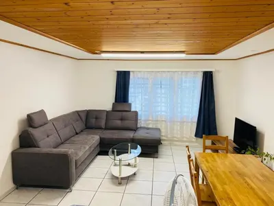 Ein Sitzbereich in der Unterkunft Matten Central Residences