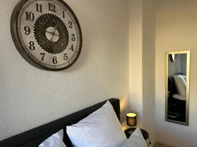 Ein Bett oder Betten in einem Zimmer der Unterkunft Sion Central Station proche toutes commodites