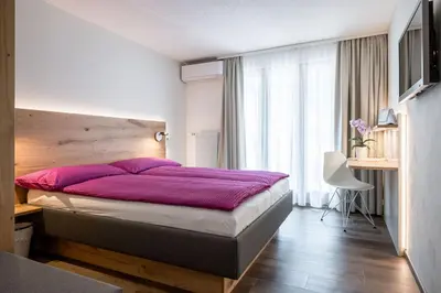 Ein Bett oder Betten in einem Zimmer der Unterkunft Hotel Zur Traube