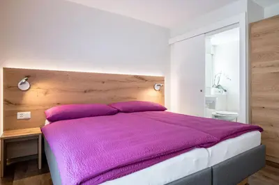 Ein Bett oder Betten in einem Zimmer der Unterkunft Hotel Zur Traube