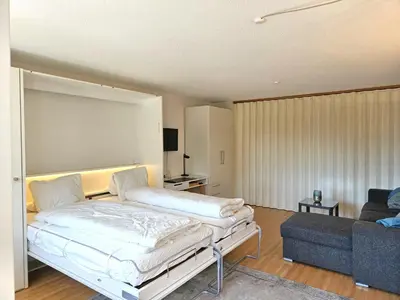 Ein Bett oder Betten in einem Zimmer der Unterkunft Haus Europe