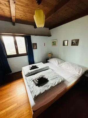 Ein Bett oder Betten in einem Zimmer der Unterkunft Casa Ilvea