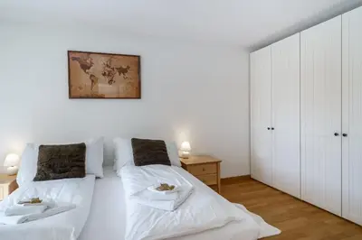 Ein Bett oder Betten in einem Zimmer der Unterkunft Chalet Bergrose 1