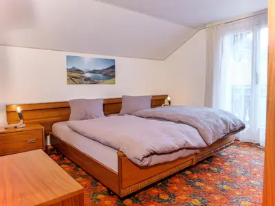 Ein Bett oder Betten in einem Zimmer der Unterkunft Holiday Home Chalet Dori by Interhome
