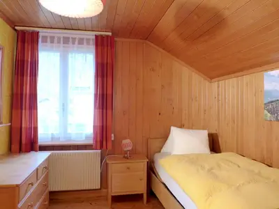Ein Bett oder Betten in einem Zimmer der Unterkunft Holiday Home Chalet Dori by Interhome