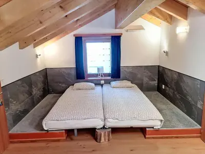 Ein Bett oder Betten in einem Zimmer der Unterkunft Apartment Ryad C by Interhome
