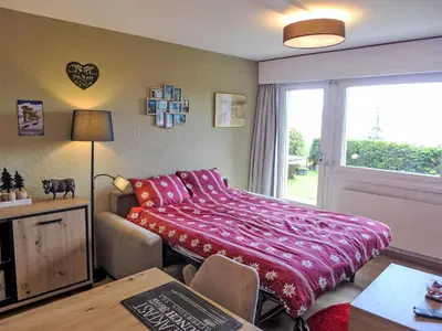 Ein Bett oder Betten in einem Zimmer der Unterkunft Apartment Les Essampilles 25 by Interhome